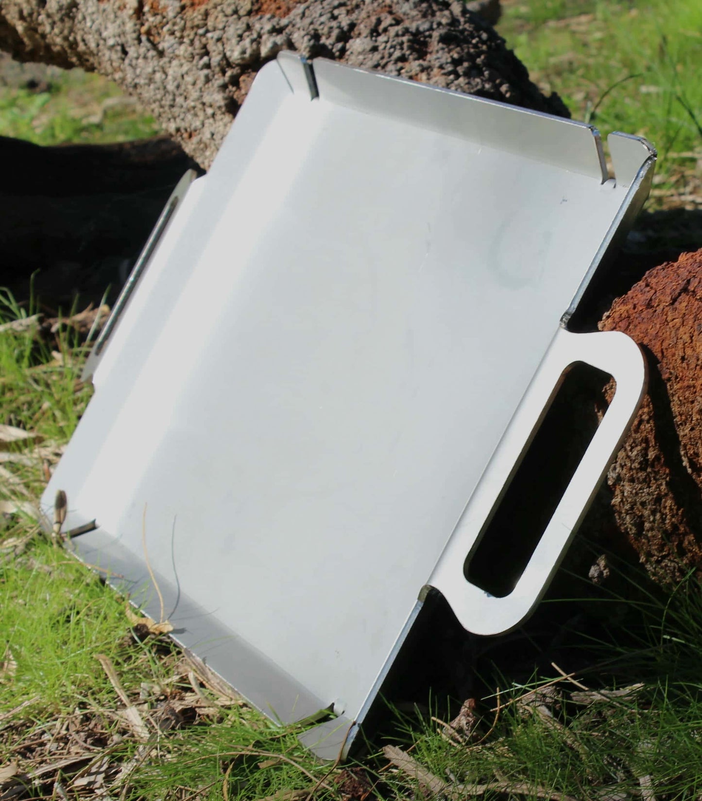 Stainless steel hot plate designed for the portable fire pit