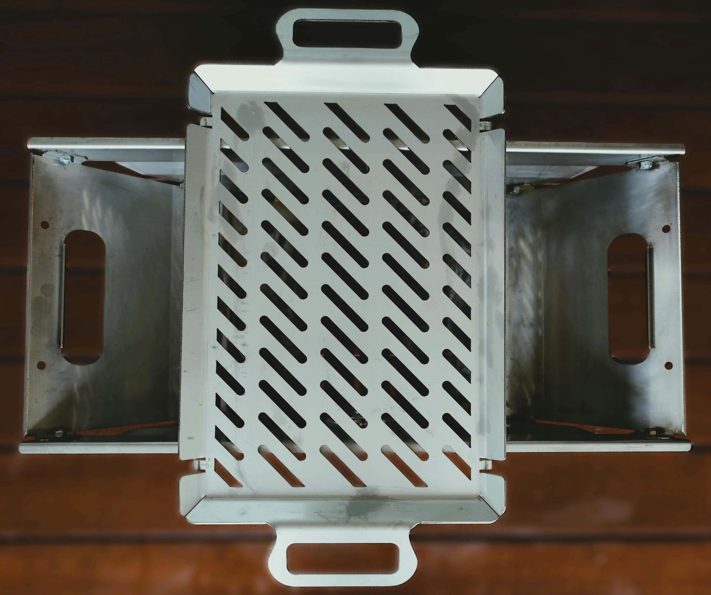 Grilling plate sitting on top of fire pit
