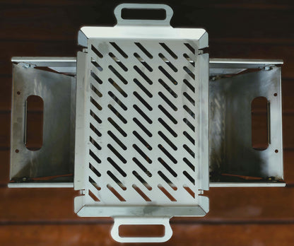Grilling plate sitting on top of fire pit